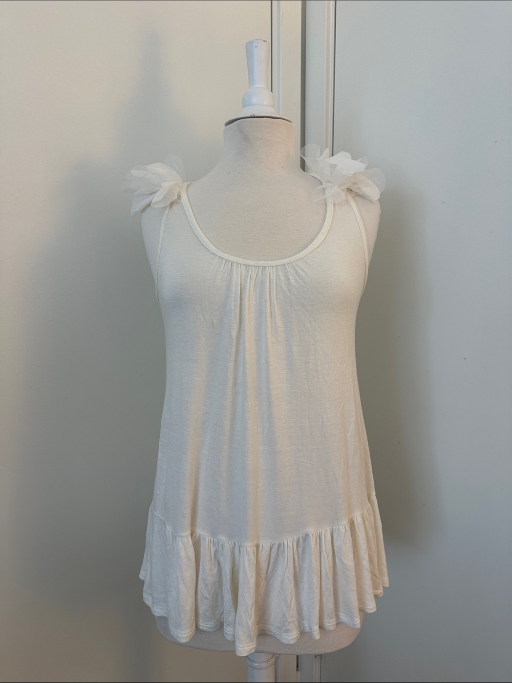 Romeo & Juliet Couture White Peplum Tank
